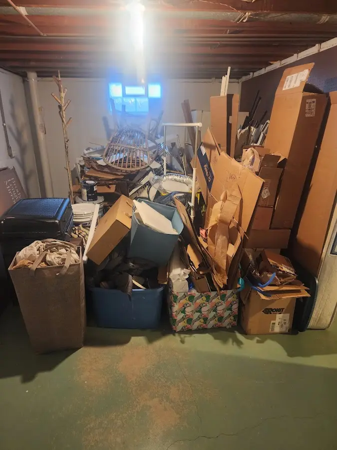 Roll-off dumpster container at job site for 8 Yard Dumpster Rental in Lewiston